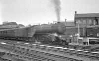 Gresley V2 2-6-2 no 60870 photographed at Doncaster station on 31 May 1963 with an up special from Leeds Central to Folkestone Harbour.<br><br>[K A Gray 31/05/1963]