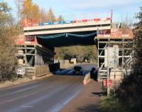 With its recently added deck now in place, the Gore Glen bridge spans the A7 on 13 November 2013.<br><br>[John Furnevel 13/11/2013]