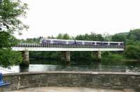 An afternoon Dundee - Glasgow Queen Street service crosses the Tay Viaduct at Perth in July 2006.<br><br>[John Furnevel 15/07/2006]