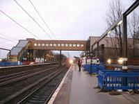 Looking north along the up platform at Westgate, with the 08.23 CrossCountry Voyager for Plymouth approaching. The new station building opens for business this Sunday 22 December.<br><br>[David Pesterfield 18/12/2013]