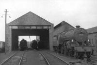 Shed scene at Stranraer on 5 August 1962. Nearest the camera is Corkerhill <I>Crab</I> 2-6-0 no 42915.<br><br>[David Stewart 05/08/1962]
