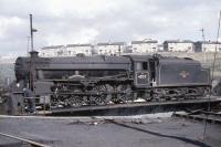 Black 5 no 45157 <i>Glasgow Highlander</i> on the turntable at Eastfield shed in the summer of 1961. Only 4 of the 842 Black 5s carried names during their normal operational service, although several have since been named in preservation.<br><br>[John Robin /07/1961]