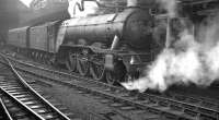 A3 Pacific 60051 <I>Blink Bonny</I> photographed at Newcastle Central with an unidentified train in 1961.<br><br>[K A Gray //1961]