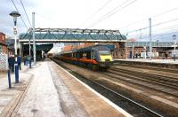A Grand Central HST set disappears northwards on the through road at Doncaster on 12 March 2013.<br><br>[John McIntyre 12/03/2013]