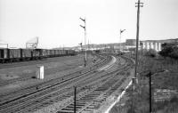 The signals are <I>off</I> but no trains appear; Craiginches North box is switched out one weekend in May 1975. The view is east from the bridge carrying Wellington Road over the railway. Today there are fewer sidings but the Blue Circle cement building still stands.<br><br>[John McIntyre 25/05/1975]