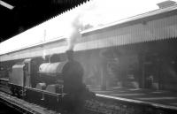 No 48 runs light engine through Portadown station in the summer of 1965. [Ref query 4553]<br><br>[K A Gray 28/08/1965]