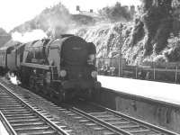 Bulleid West Country Pacific no 34042 <I>Dorchester</I> pulls into the northbound platform at Winchester (then Winchester City) on 15 August 1961 with the 11.16am Bournemouth West - Newcastle Central. [Ref query 5321]<br><br>[K A Gray 15/08/1961]