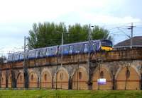 A westbound emu on the viaduct at Yorkhill on 22 April 2014.<br><br>[Colin Miller 22/04/2014]