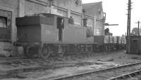 Drummond M7 0-4-4T no 30676 stands in the shed yard at Exmouth Junction on a wet 10 August 1960, approximately one year before withdrawal.<br><br>[K A Gray 20/08/1960]