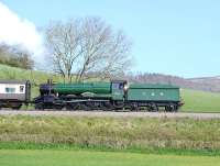 GWR 6960 <I>Raveningham Hall</I> departing Williton tender first on 13 April with a train on the West Somerset Railway.<br><br>[Peter Todd 13/04/2014]