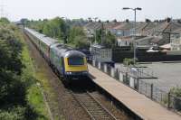 FGW 43020 accelerates through Weston Milton halt with the 1450 Weston-super-Mare to Paddington on 18 May. At this point the train is still on the single track Weston loop but will join the main line at Worle Junction. <br><br>[Mark Bartlett 18/05/2014]