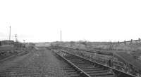 Looking west, back towards Kelso, along the staggered eastbound platform at Carham in early 1966, approximately a year after closure of the line.<br><br>[Bruce McCartney //1966]
