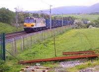 A long way from the Channel Tunnel - 92037 heading South with containers past an NR acess point on 23rd May.<br><br>[Ken Strachan 23/05/2014]