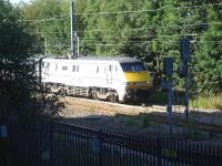 91107 starts out on time at 08.03 from platform 2 at Wakefield Westgate on the final leg of its journey from Kings Cross to Leeds on 14 July. Photographed from the new multi storey car park. <br><br>[David Pesterfield 14/07/2014]