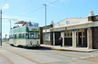 August Bank Holiday means Heritage trams in Blackpool. Open top <I>Balloon</I> 706 <I>Princess Alice</I> has just arrived at Bispham station and is now drawing forward to reverse and return to Pleasure Beach. <br><br>[Mark Bartlett 23/08/2014]