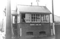 A smile from the signalman at Abermule on 6 August 1960. A tragic 'misunderstanding' between staff at this station some 39 years earlier led to a single line head-on collision resulting in 17 fatalities. [Ref query 8091]<br><br>[David Stewart 06/08/1960]