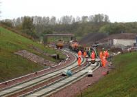 The Dutch track-laying train inches steadily southwards from Newcraighall on 6 October 2014 [see image 48935] propelled by a GB Railfreight Class 66 .... just 30 miles to go!<br><br>[David Spaven 06/10/2014]