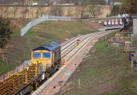 GBRf 66736 continuing tracklaying on the up line to the south of Shawfair Station on 7 October 2014.<br><br>[Bill Roberton 07/10/2014]