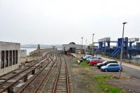 A general view of Stranraer Station looking inland in April 2014, also visible is part of the once busy ferry terminal, now closed and completely fenced off.<br><br>[John Gray 30/04/2014]