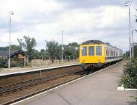 A Yorkshire Coast Line DMU southbound through Nafferton station in the summer of 1980 on its way to Hull.<br><br>[Peter Todd 18/08/1980]