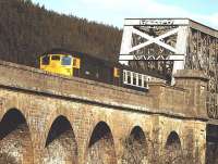 26036 crossing the viaduct over the River Spey at Orton in April 1982, taking a train east towards Aberdeen.<br><br>[Peter Todd 29/04/1982]