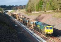 Freightliner 66610 on a ballast train just north of Tynehead station on 10 November 2014. Sister locomotive 66605 is on the other end of the train.  <br><br>[Ewan Crawford 10/11/2014]