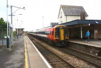 Looking west at Gillingham (Dorset) on 18 October 2014 as a pair of South West Trains Class 159 DMUs departs on a Waterloo to Exeter service.<br><br>[John McIntyre 18/10/2014]