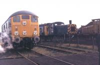 A mix of classic railway vehicles at Steamport, Southport, during an open day in 1982. BR Sulzer 24081, preserved for only two years at this time, was on static display, while 03189, still in BR service at Birkenhead, was shuttling passengers between Steamport and the main line station in a Derby Class 108 DMU. The yellow industrial shunter to the right was still in use in Southport's Coal Concentration Depot.   <br><br>[Mark Bartlett 11/09/1982]