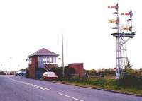 Winning signal box and level crossing, view west towards the junction on 25 May 2004.<br><br>[John Furnevel 25/05/2004]
