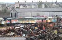47776 stands among the scrap and other stored locos in the component recovery area at the West Coast Railways Carnforth Depot on 5 January 2015. The RES Brush 4, which has been here since 2007, is flanked by 47368 and 47526 with operational shunter 08418 just visible behind.<br><br>[Mark Bartlett 05/01/2015]
