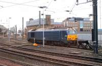 67003 waits at the buffers in a siding by the 1891 (and now grade II listed) water tower at the west end of Newcastle Central station on 10th February 2015.<br><br>[Colin McDonald 10/02/2-15]
