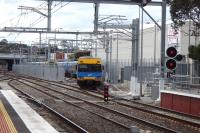A Metro emu runs into the new sidings at Sunbury Victoria provided on electrification. View to the north [see image 41757 as it used to be].<br><br>[Colin Miller 30/09/2014]