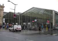 The eastern end of Gare du Nord is outside the main building and is covered by a modern glass structure, as seen in this view of 26 February 2015.<br><br>[David Pesterfield 26/02/2015]