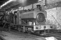 Inside the NCB shed at Mountain Ash on 19 October 1973 is 0-6-0ST <I>Llantarnam Abbey</I> (note the missing 'R' on the right hand tank-side) built by Andrew Barclay as No. 2074/1939. I have no record of the loco behind it but bringing up the rear appears to be the perhaps more interesting Avonside-built <I>Sir John</I> (No. 1680/1914).<br><br>[Bill Jamieson 19/10/1973]