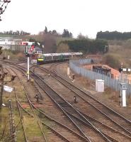 Semaphore signals and manual boxes - enjoy them while you can. A class 170 heads for Bromsgrove at Droitwich on 30 March 2015 [see image 7088].<br><br>[Ken Strachan 30/03/2015]