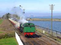 Ex-NCB Comrie Colliery no.19 (Hunslet 3818 of 1954) arrives at Bo'ness on 6 April with a service from Manuel.  In the background is the doomed Longannet Power Station.<br><br>[Bill Roberton 06/04/2015]
