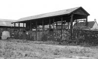 The business side of the old coaling stage at Tweedmouth in 1970, obviously capable of dealing with two locos at any one time. If necessary, the far side could probably have been modified to coal locos from there as well, but the number of tenders and bunkers requiring to be replenished at any one time presumably never justified this. The blocked up entrance to the roundhouse is on the left.<br><br>[Bill Jamieson 19/09/1970]