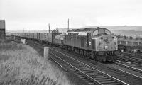 EE Type 4 No. 276 passes between Tweedmouth Yard and the closed MPD with the 11:50  Aberdeen to Kings Cross Freightliner on 19 September 1970. While a bulled-up green class 40 could look very smart [see image 26757], my opinion is that in more typical condition they looked drab in the extreme and that the blue livery was actually an improvement, something not necessarily the case for every class.<br><br>[Bill Jamieson 19/09/1970]