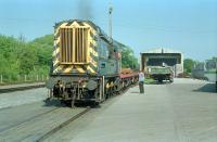 08675 shunting flatbeds carrying steel sections at Stockton Haulage, Stranraer, in 1989.<br><br>[Ewan Crawford //1989]