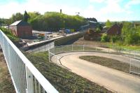 New infrastructure at Newtongrange, photographed on the morning of 26 April 2015, including pedestrian access from the housing developments on the west side of the line to reach the south side of the A7. The platform will be accessible via a ramp and stairway on the east side of the road bridge. [See image 13782] <br><br>[John Furnevel 26/04/2015]