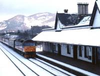 A southbound train runs into Dunkeld station on a bitterly cold January evening in 1991.<br><br>[Ewan Crawford /01/1991]
