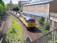 Colas 56087 with an Alloa - Millerhill empty ballast train runs through the site of Newington station on 17 May 2015.<br><br>[Bill Roberton 17/05/2015]