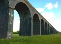 Not so much a viaduct, as a railway in the sky. [see image 51582] This structure was on the MR from Kettering to Manton Junction; whereas Seaton was on a cross-country LNWR route.<br><br>[Ken Strachan 07/06/2015]