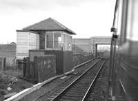 The surviving signal box at Bogside (formerly Bogside Race Course) in the summer of 1985. Photographed from a train passing the site of the station which closed in 1967. [See image 23519]<br><br>[Bill Roberton 31/08/1985]