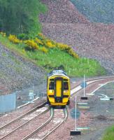 A ScotRail 158 involved in driver training duty on 26 June 2015. The train is in the process of running north through the points at Tynehead and entering the double track section to Fushiebridge.<br><br>[John Furnevel 26/06/2015]