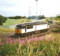 The Cockenzie branch lost its raison d'etre in 2013 when the coal-fired power station was closed. Back in July 1995 Transrail liveried 56072 is seen here returning to the main line after working the branch.<br>
<br><br>[David Panton 19/07/1995]