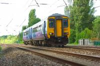 The Northern 1603 service from Blackpool North to Liverpool Lime Street approaches Bridge 90 at Euxton on 27 June 2015.<br><br>[John McIntyre 27/06/2015]