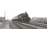 Stanier 3P 2-6-2T 40176 leaving Tollcross eastbound on 27 July 1961. The train is a Dumbarton Central to Carmyle service.  <br><br>[G H Robin collection by courtesy of the Mitchell Library, Glasgow 27/07/1961]