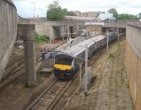 Looking down at the junction between east and westbound lines at Exhibition Centre station on 2 August 2015 as an eastbound service heads for the city centre.<br><br>[John McIntyre 02/08/2015]