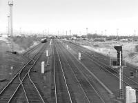Looking north over Millerhill Yard from Old Craighall Road bridge on 18 March 1987, with the former Waverley Route main line running through the centre.<br><br>[Bill Roberton 18/03/1987]